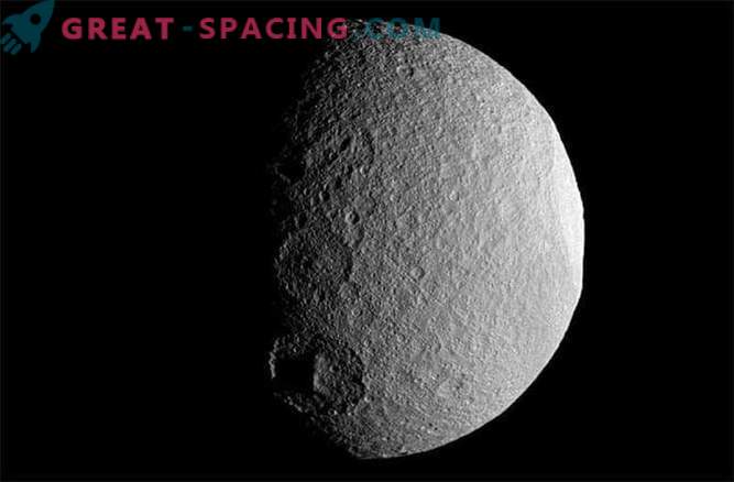 Why are erased craters on Saturn's moons?