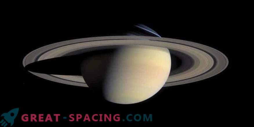 Saturn could participate in the formation of the large moons of Jupiter