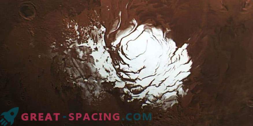 What is hidden under the south polar cap of Mars