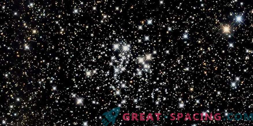What hides the open cluster closest to the Sun?